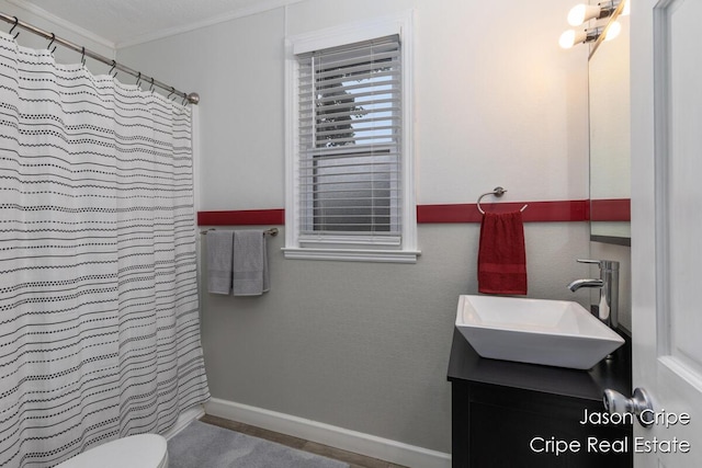 109 Fuller Ave SE, Grand Rapids, MI 49506 - full bath featuring vanity, ornamental molding, and curtained shower