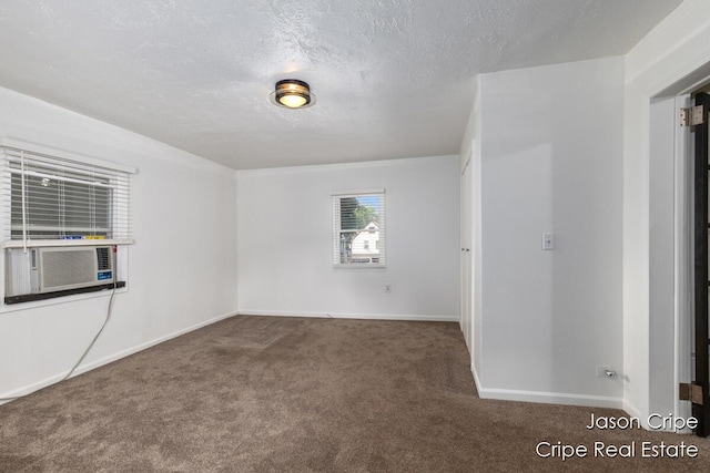 109 Fuller Ave SE, Grand Rapids, MI 49506 - carpeted empty room featuring a textured ceiling and cooling unit