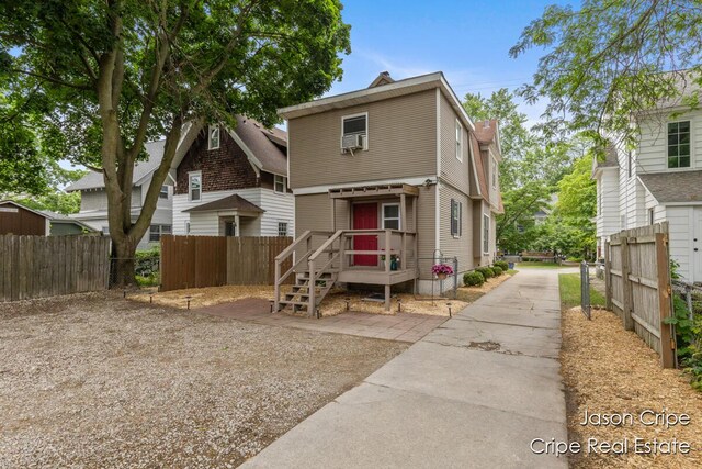 109 Fuller Ave SE, Grand Rapids, MI 49506 - view of front of home featuring a chimney and cooling unit
