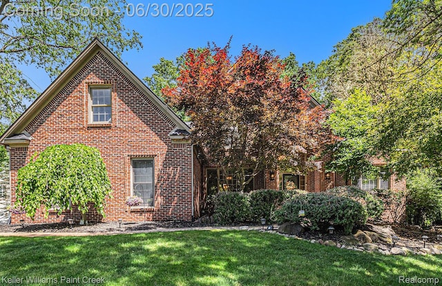 2868 Masters Ct, Pinckney, MI 48169 - view of front of property featuring a front lawn and brick siding