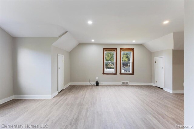 45866 Gable Inn St, Shelby Twp, MI 48317 - additional living space with light wood-style floors, lofted ceiling, and recessed lighting