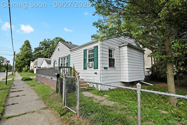 166 W Milton Ave, Oak Park, MI 48030 - view of side of property with cooling unit and a gate