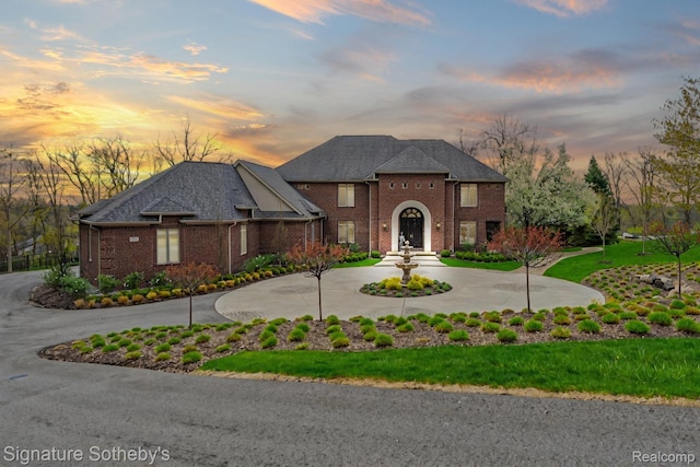 5001 Forest Vly, Clarkston, MI 48348 - colonial home featuring brick siding and curved driveway