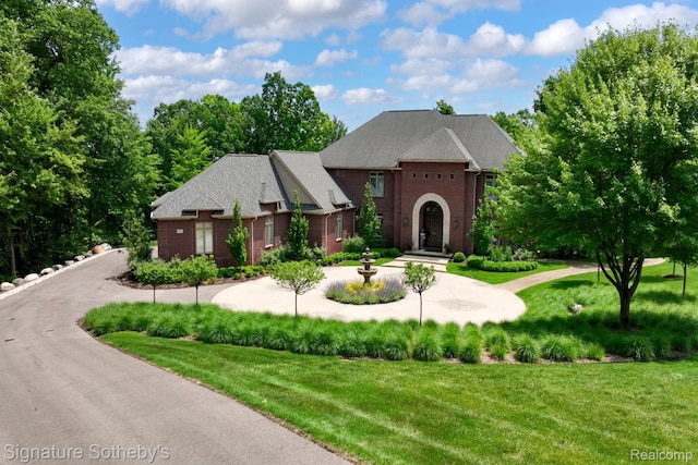 5001 Forest Vly, Clarkston, MI 48348 - view of front of property featuring brick siding and a front lawn