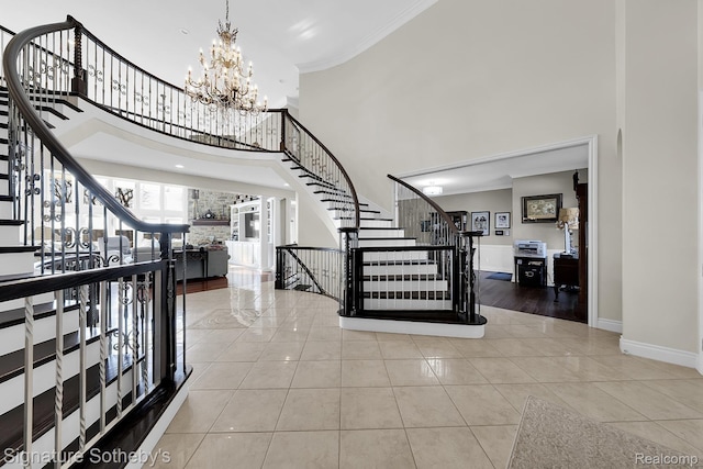 5001 Forest Vly, Clarkston, MI 48348 - foyer featuring stairway, a high ceiling, crown molding, tile patterned floors, and a chandelier