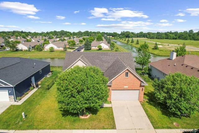 70298 Sunny Brook Ln, Macomb, MI 48062 - aerial perspective of suburban area with a nearby body of water