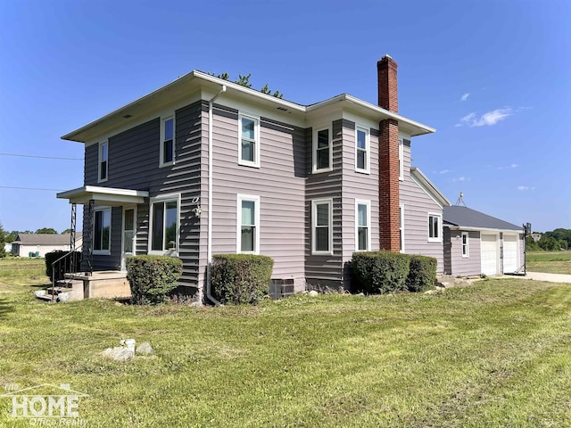 10306 Reid Rd, Swartz Creek, MI 48473 - view of side of property featuring a chimney and a yard