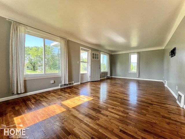 10306 Reid Rd, Swartz Creek, MI 48473 - unfurnished living room featuring wood finished floors