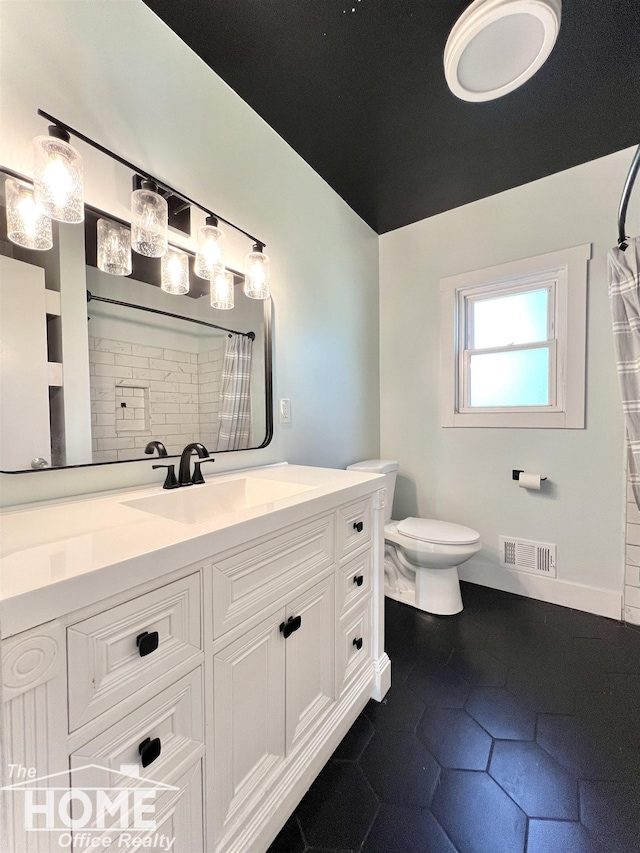 10306 Reid Rd, Swartz Creek, MI 48473 - full bathroom featuring vanity and a shower with shower curtain