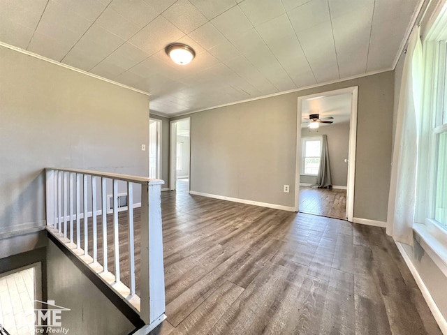 10306 Reid Rd, Swartz Creek, MI 48473 - empty room featuring ornamental molding, wood finished floors, and ceiling fan