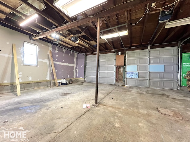 10306 Reid Rd, Swartz Creek, MI 48473 - garage with a garage door opener