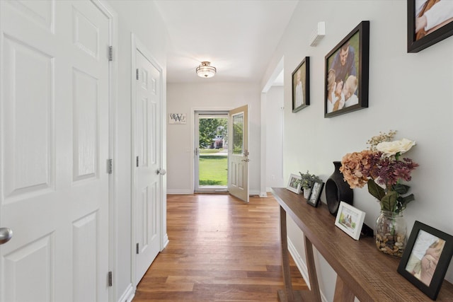 6212 Sagamore Ln, Kalamazoo, MI 49004 - hallway featuring wood finished floors and baseboards