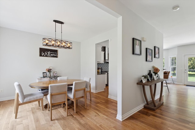 6212 Sagamore Ln, Kalamazoo, MI 49004 - dining space featuring light wood-style flooring and baseboards