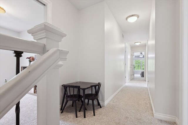 6212 Sagamore Ln, Kalamazoo, MI 49004 - hall with carpet and an upstairs landing