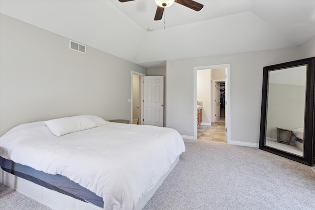 6212 Sagamore Ln, Kalamazoo, MI 49004 - bedroom with light carpet, ensuite bath, and ceiling fan
