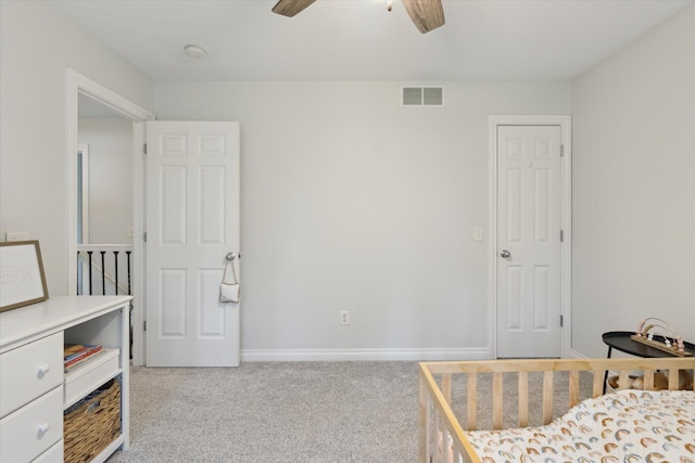 6212 Sagamore Ln, Kalamazoo, MI 49004 - carpeted bedroom with baseboards and ceiling fan