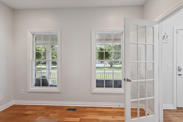 6212 Sagamore Ln, Kalamazoo, MI 49004 - doorway with wood finished floors and baseboards