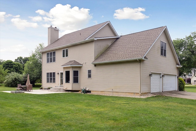 6212 Sagamore Ln, Kalamazoo, MI 49004 - back of property with an attached garage, a shingled roof, a chimney, a lawn, and concrete driveway