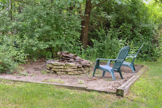 6212 Sagamore Ln, Kalamazoo, MI 49004 - view of yard with an outdoor fire pit