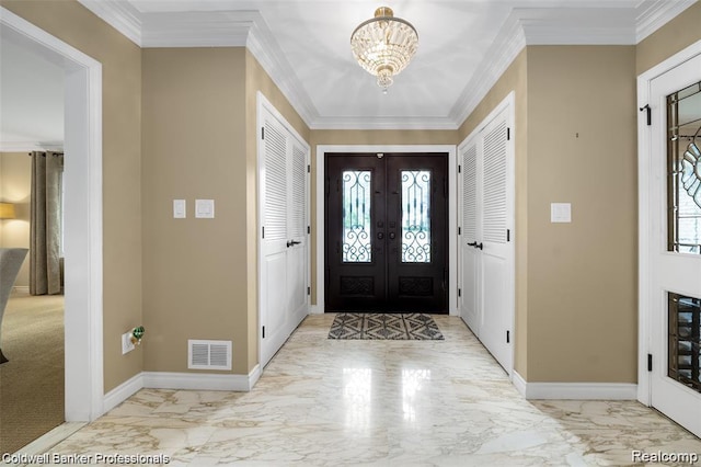 4462 Barchester Dr, Bloomfield Hills, MI 48302 - entryway with marble finish floors, a chandelier, and ornamental molding