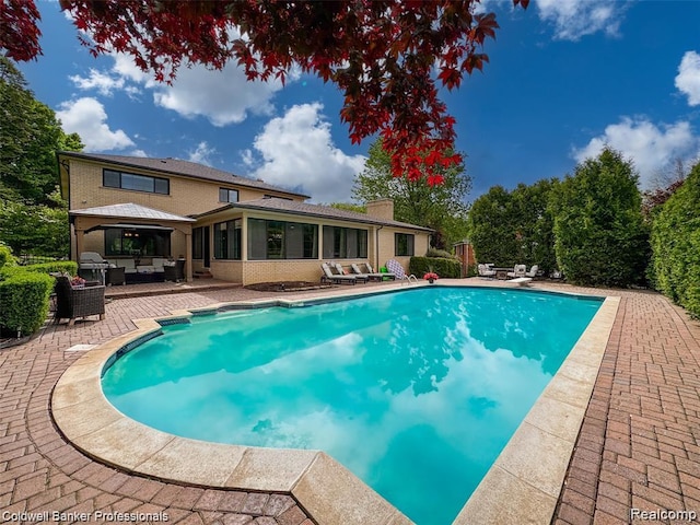 4462 Barchester Dr, Bloomfield Hills, MI 48302 - swimming pool featuring outdoor lounge area, a patio area, a sunroom, area for grilling, and a gazebo