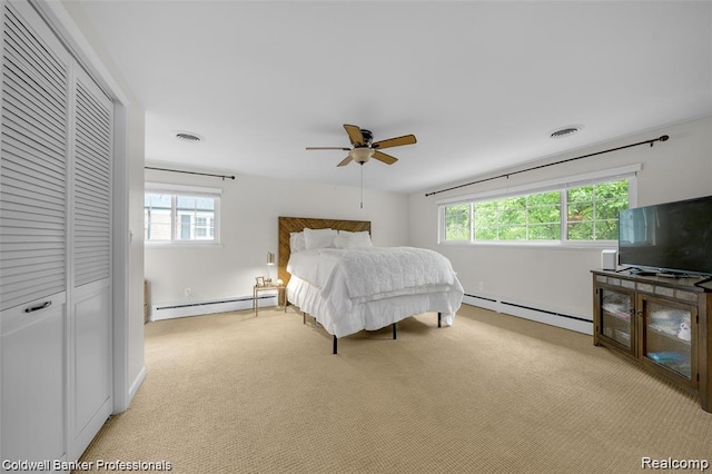 4462 Barchester Dr, Bloomfield Hills, MI 48302 - bedroom with a baseboard radiator, light colored carpet, and multiple windows
