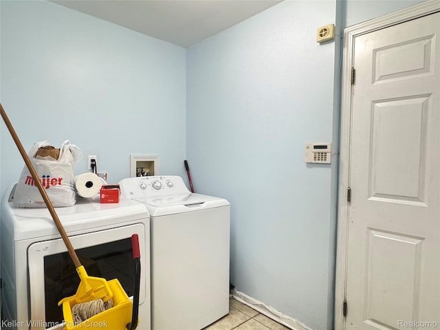 20839 Sunset Ave, Warren, MI 48091 - washroom featuring separate washer and dryer and light tile patterned floors