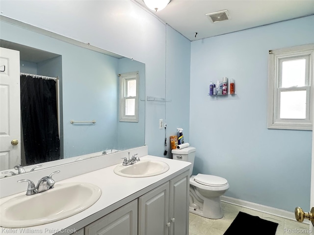 20839 Sunset Ave, Warren, MI 48091 - full bathroom with double vanity and tile patterned flooring