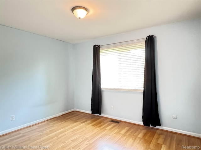20839 Sunset Ave, Warren, MI 48091 - unfurnished room featuring wood finished floors and baseboards