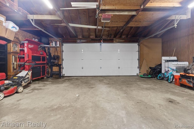 4438 Bridgeman Trl, Swartz Creek, MI 48473 - garage featuring a garage door opener