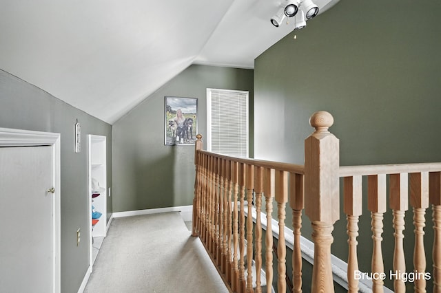 920 Graceland St NE, Grand Rapids, MI 49505 - hall with lofted ceiling, carpet flooring, and an upstairs landing