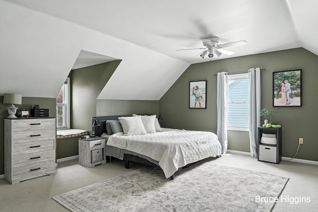 920 Graceland St NE, Grand Rapids, MI 49505 - bedroom with vaulted ceiling, light colored carpet, and a ceiling fan