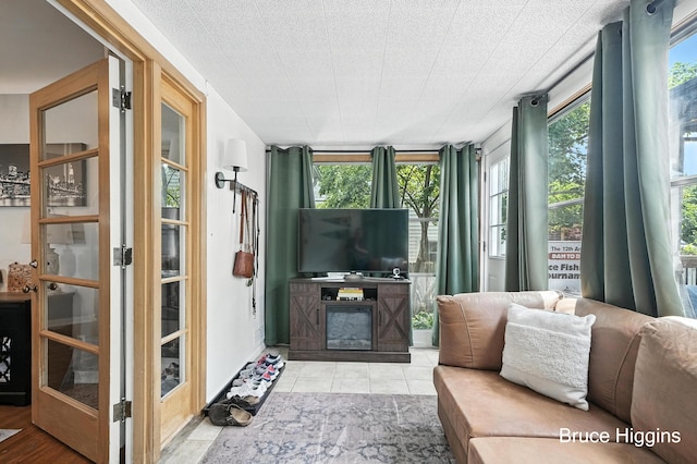 920 Graceland St NE, Grand Rapids, MI 49505 - tiled living room with a fireplace