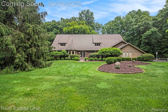 11921 Brandywine Dr, Brighton, MI 48114 - view of front of house with a front lawn