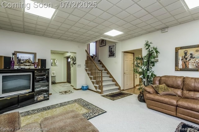 31085 Estate Woods Ct, Farmington Hills, MI 48331 - living room featuring stairs, carpet floors, and a paneled ceiling