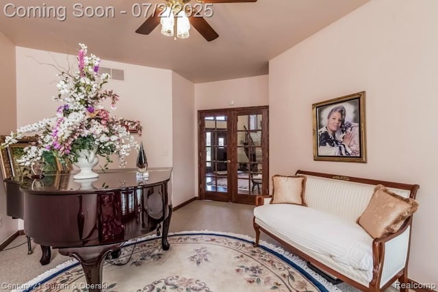 31085 Estate Woods Ct, Farmington Hills, MI 48331 - sitting room with french doors, a ceiling fan, and carpet