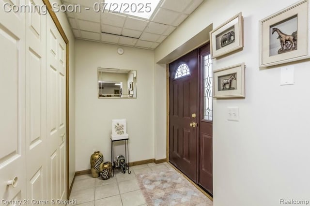 31085 Estate Woods Ct, Farmington Hills, MI 48331 - entryway featuring a drop ceiling and light tile patterned floors