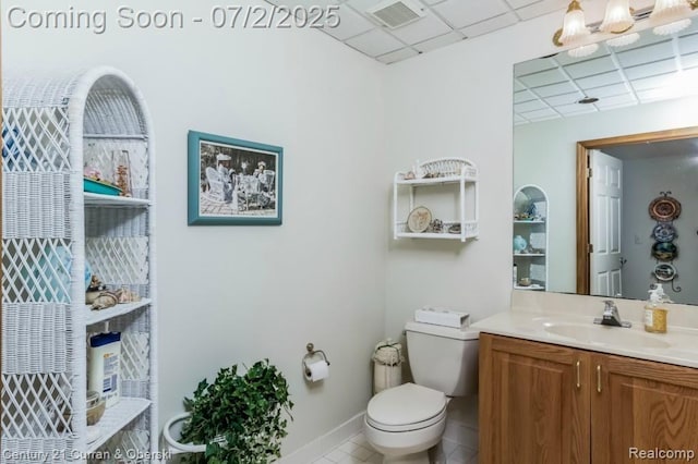 31085 Estate Woods Ct, Farmington Hills, MI 48331 - bathroom with a drop ceiling, vanity, and tile patterned floors