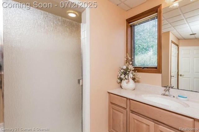 31085 Estate Woods Ct, Farmington Hills, MI 48331 - full bath with a paneled ceiling, a shower stall, and vanity