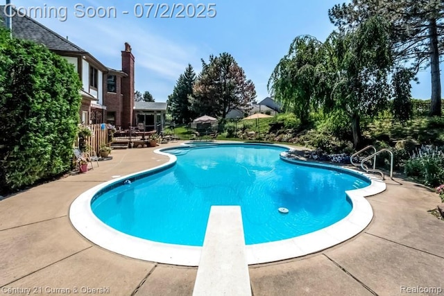 31085 Estate Woods Ct, Farmington Hills, MI 48331 - view of pool with a diving board and a patio area