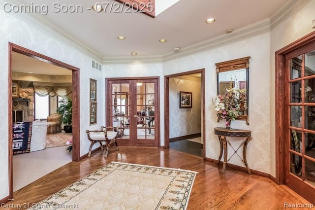 31085 Estate Woods Ct, Farmington Hills, MI 48331 - foyer entrance with french doors, wood finished floors, crown molding, and recessed lighting