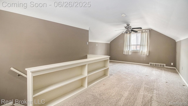9269 Hubert Ave, Taylor, MI 48101 - additional living space with carpet, vaulted ceiling, and a ceiling fan
