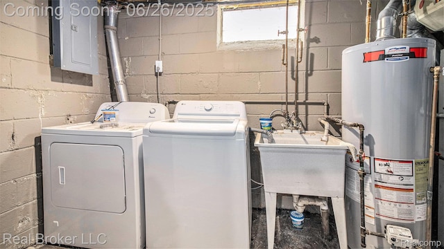 9269 Hubert Ave, Taylor, MI 48101 - laundry area with water heater, washer and clothes dryer, and electric panel