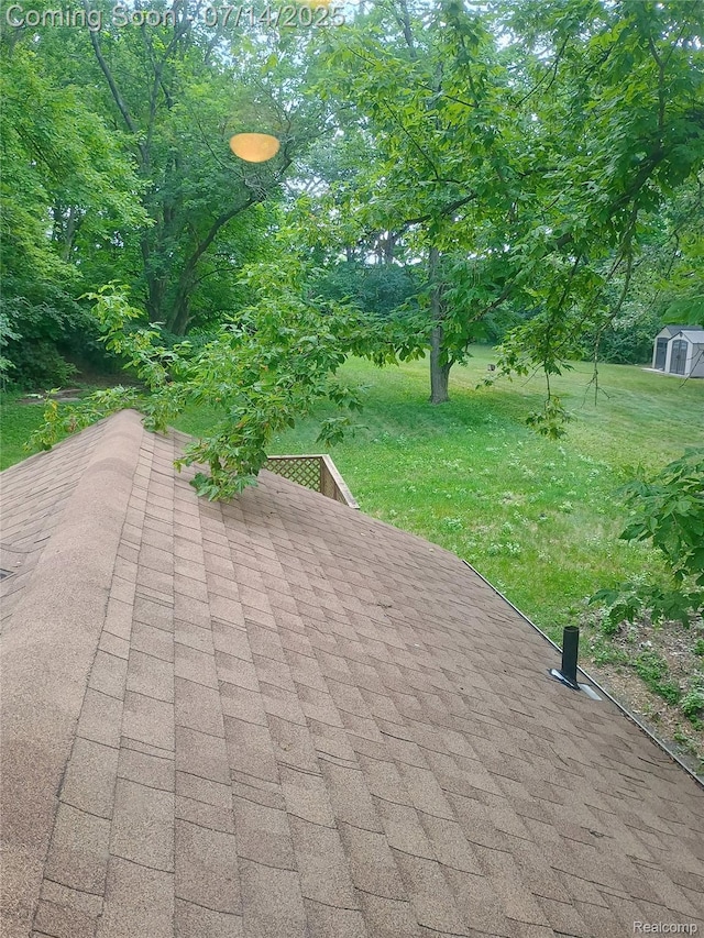 19241 Melrose Ave, Southfield, MI 48075 - view of patio featuring a storage unit