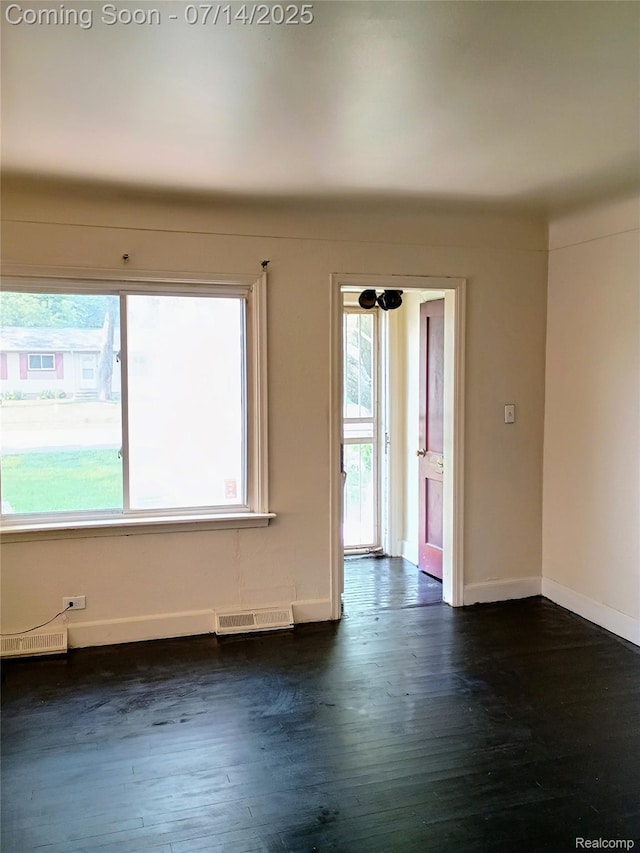 19241 Melrose Ave, Southfield, MI 48075 - unfurnished room featuring dark wood-style flooring and baseboards