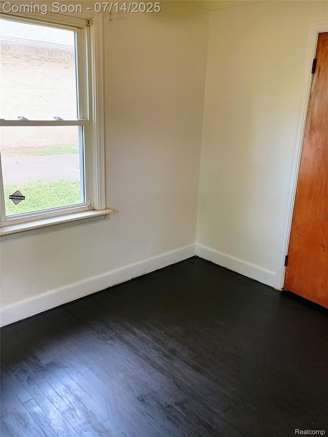 19241 Melrose Ave, Southfield, MI 48075 - empty room featuring baseboards and dark wood-style floors