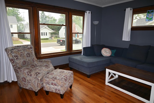 2245 Morton Ave, Muskegon, MI 49441 - living room featuring ornamental molding and wood finished floors