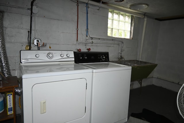 2245 Morton Ave, Muskegon, MI 49441 - laundry area with washing machine and clothes dryer