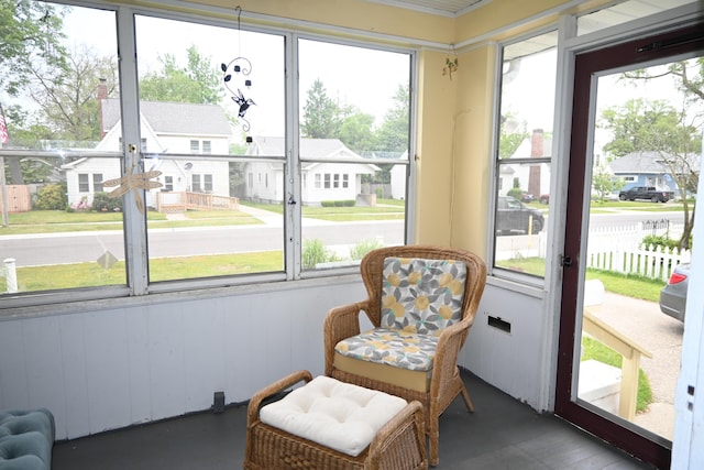 2245 Morton Ave, Muskegon, MI 49441 - sunroom featuring a residential view