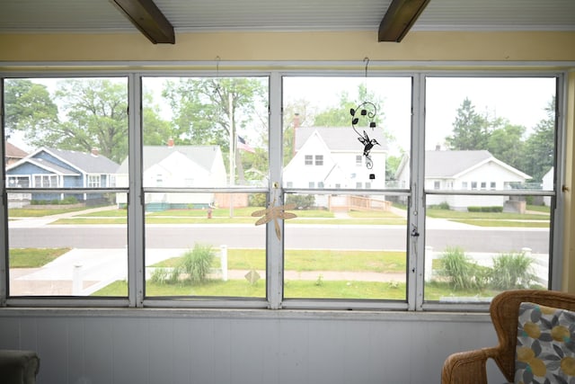 2245 Morton Ave, Muskegon, MI 49441 - sunroom / solarium featuring beam ceiling and a residential view